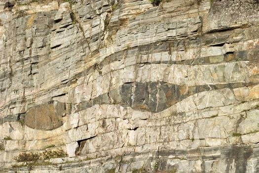 A layerd rock background texture from oslo, norway.