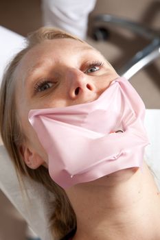 Female patient being treated at the dentist