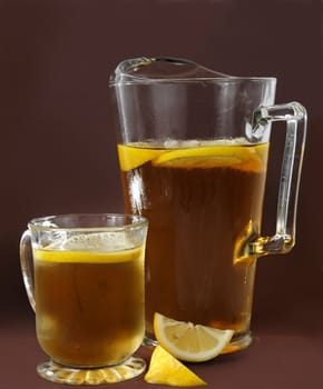 cup of ice tea with piece of lemon