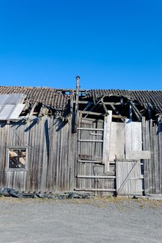 A detail of an old abandoned barn in rural Norway.
