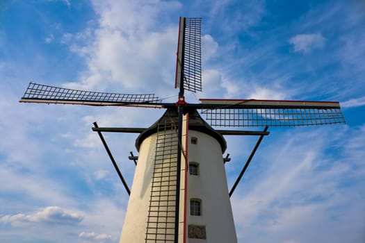 Windmill against nice blue sky