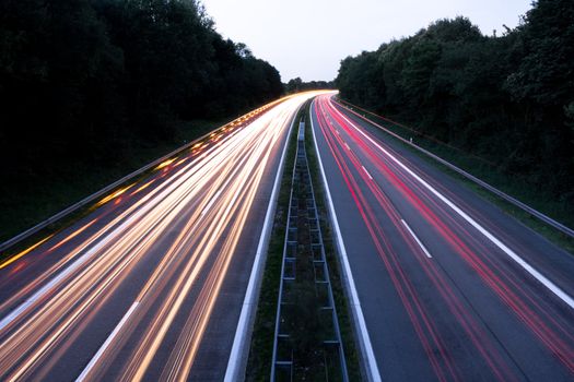 Cars speeding on a highway