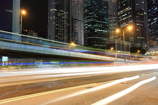 traffic in business district at night
