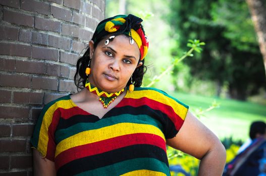 Beautiful Ethiopian young woman wearing traditional Ethiopian style tribal clothes