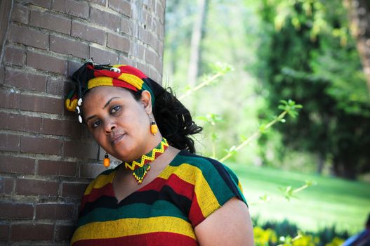 Beautiful Ethiopian young woman wearing traditional Ethiopian style tribal clothes