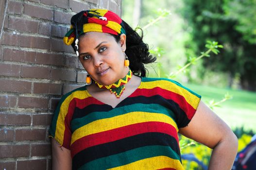 Beautiful Ethiopian young woman wearing traditional Ethiopian style tribal clothes
