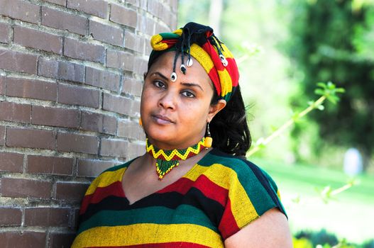 Beautiful Ethiopian young woman wearing traditional Ethiopian style tribal clothes