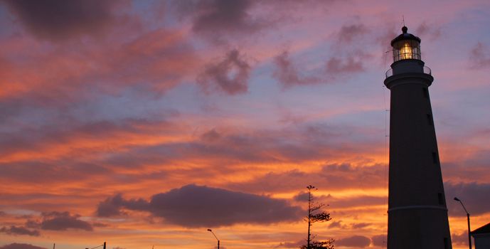 Landscape of lighthouse and roofs silhouettes. Punta del Este. Uruguay