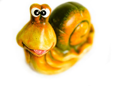 view of a snail, a beautiful snail, snail, clay, decoration, orange snail, snail smile, good mood