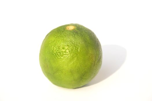 Fresh lime isolated against white