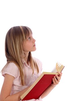 A pensive blond girl with a red book in his hand looking up against a white background - cutout