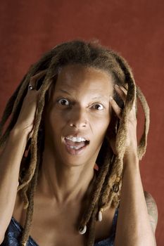 Shocked African American Woman with Hair in Dreadlocks