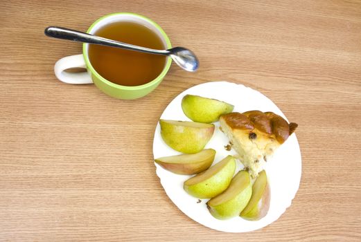 yummy pie with fruits and freshly made tea, for breakfast