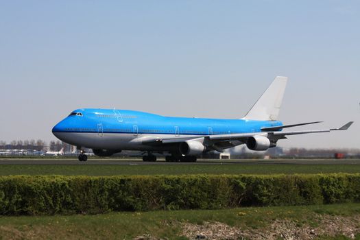 A big four engine airplane on the runway