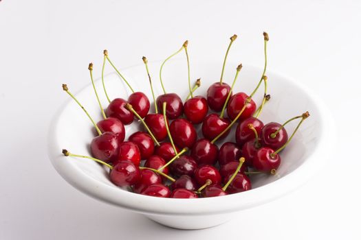 red cherries in a bowl