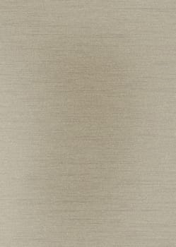 Close up of beige material that would make an ideal background