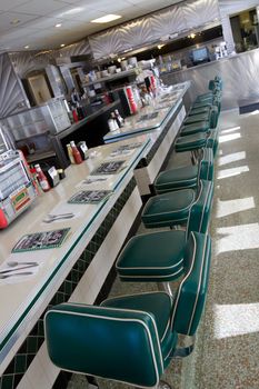 Typical american cafe in old style with green seats