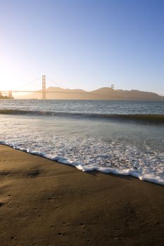 Waves near Golden Gate bridge at dusk