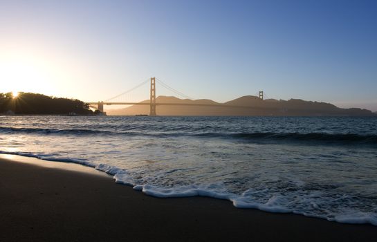 Soft waves at Golden Gate bridge over dusk