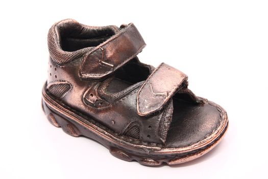 photo of a bronzed baby shoe