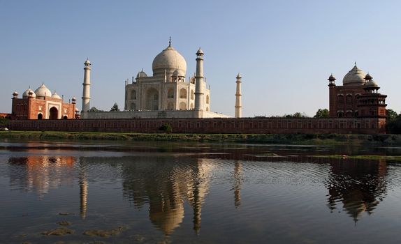 Taj Mahal mirrored in a river