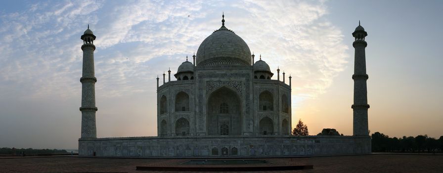 View on the Taj Mahal from the Western side at sunrise
