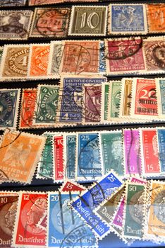 Diverse and colorful postage stamps from Germany. 

