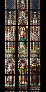 Detail of the color window - bullseye pane - lattice window. Public national monument - cathedral of St Vitus, Prague, Czech republic, Europe.