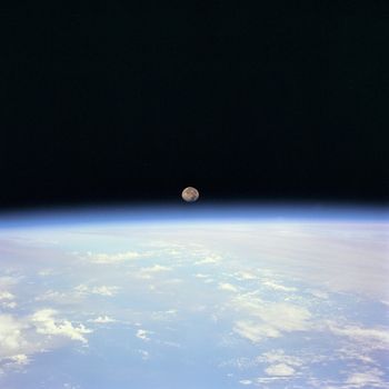 Moon set over the Earth limb taken from Space Shuttle Discovery during STS-70 mission. ** Credit: NASA / yaymicro.com **