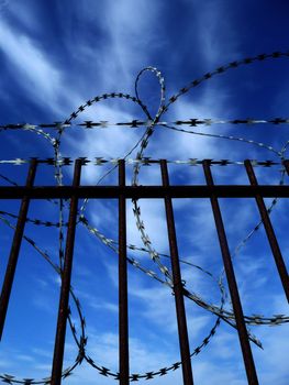 A gate with Razorwire for securer concepts.