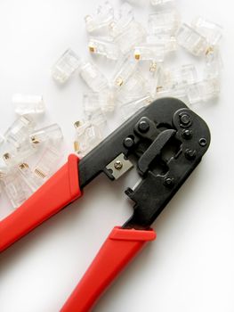 wire stripper and connectors on white