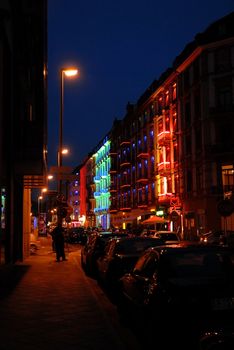 Nightlife on an urban street. Vertical picture