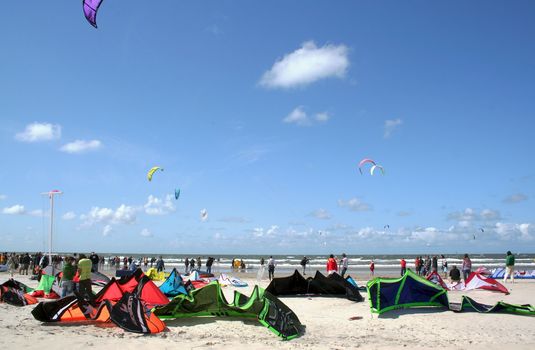 kite surfers on a beach