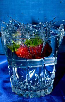 fresh strawberries, splashing in water