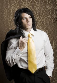 Handsome man seated in a business suit