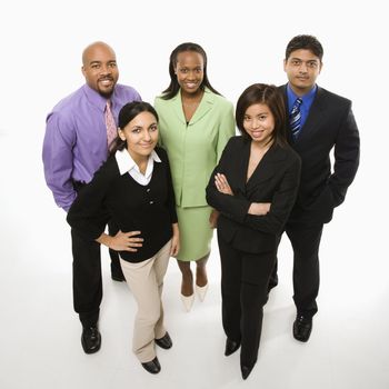 Portrait of multi-ethnic business group standing looking at viewer.