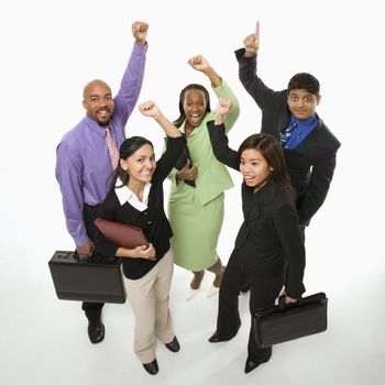 Portrait of multi-ethnic business group standing holding briefcases and cheering.