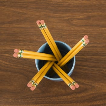 Bird's eye view of wooden pencils in cup.