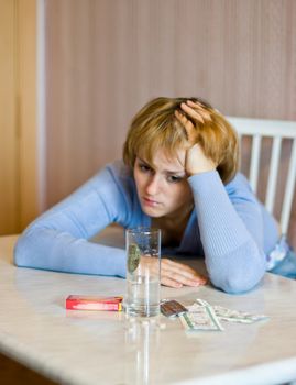 the Image of the girl which the head and tablets is ill