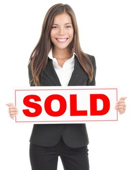 Real estate agent showing sold sign. Isolated on white background. Mixed asian / caucasian woman.