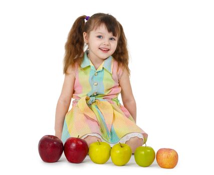 A little girl and the train of apples