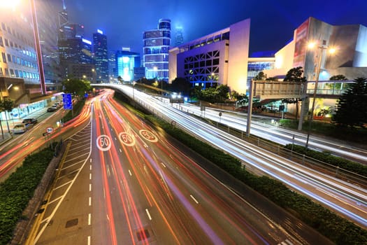 traffic in business district at night