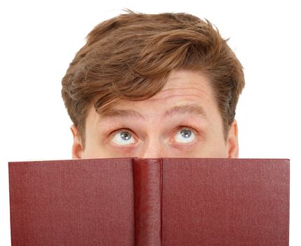 Man dreamily reading a book - close-up of the eyes