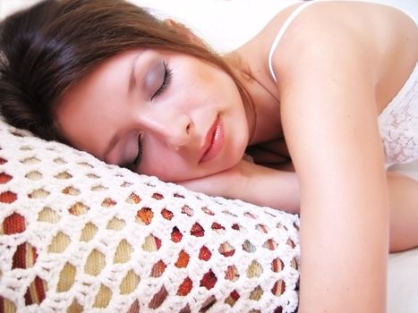 Beautiful woman sleeping on pillow