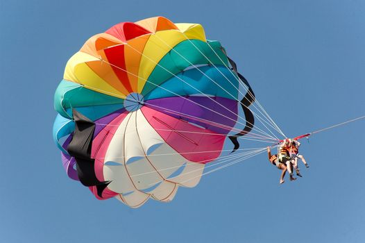 People parasailing.