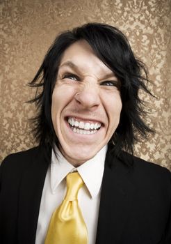 Wide angle shot of rock and roll businessman with a big smile