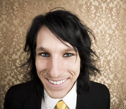 Wide angle shot of rock and roll businessman with a big smile