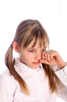 Blond, young girl crying. It can be seen tears - on a white background