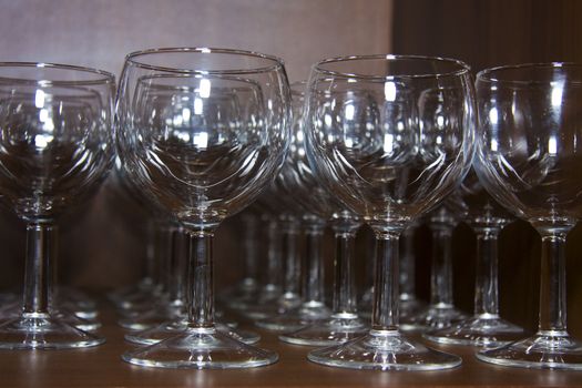A lot of glass goblets on the table