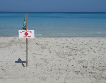 lifeguard sign on the beach